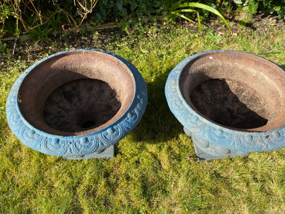 Pair of painted cast iron urns View V