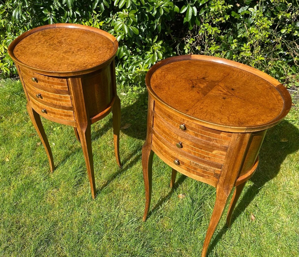 Pair of oval burr wood bedside tables 