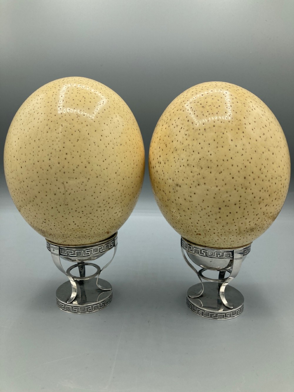 A Pair of Ostrich Eggs on Italian Silver Stands 