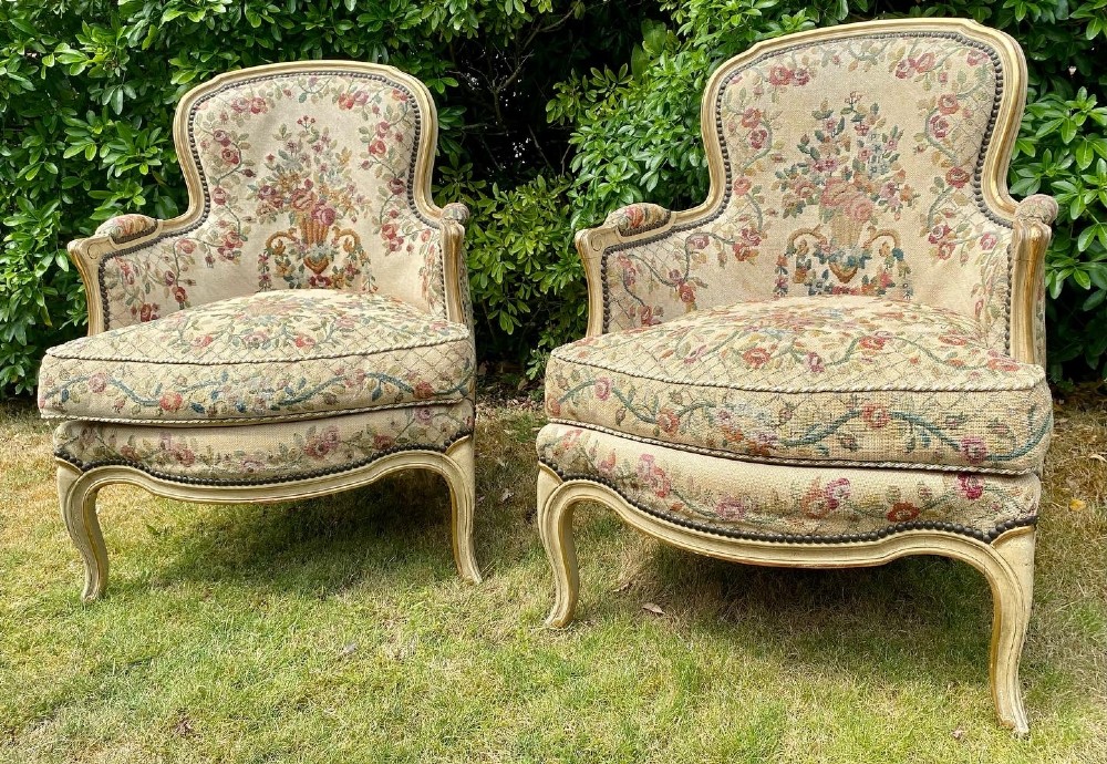 Pair of French painted needlepoint Bergere armchairs 