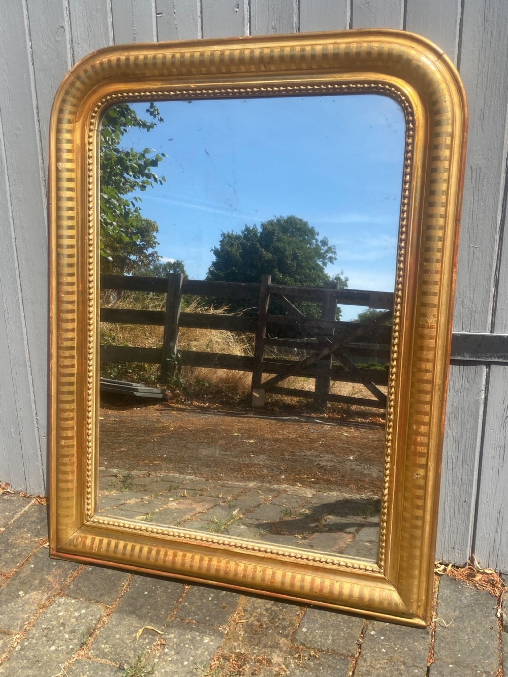 Embossed French gilt mirror 