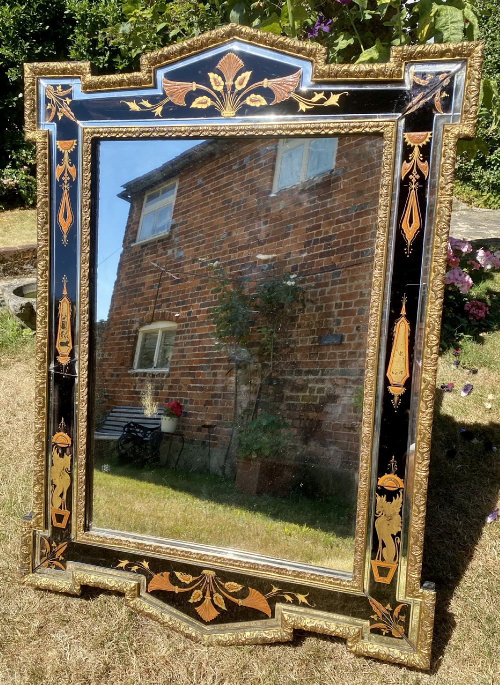 Painted and enamelled mirror 