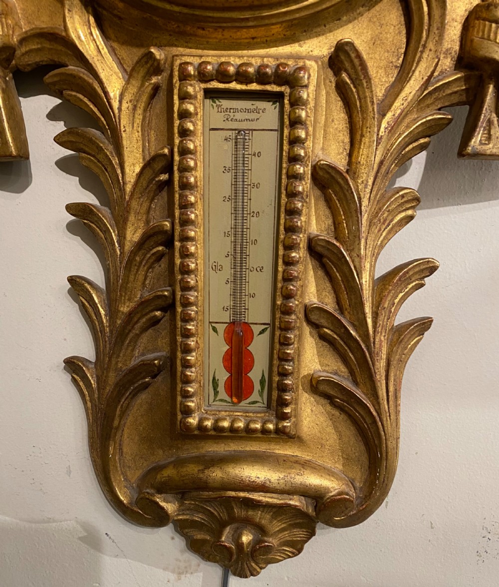 18 th Century Louis XVI barometer in gilt wood View III
