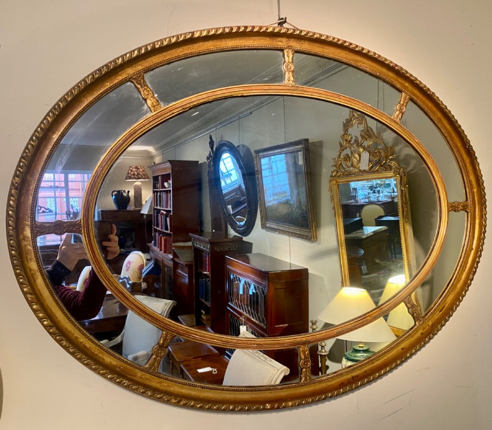 Large gilt oval mirror  View III