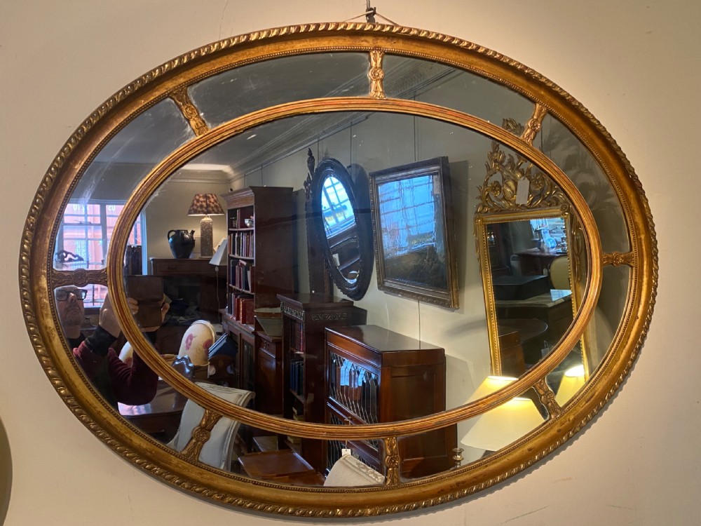 Large gilt oval mirror  View IV