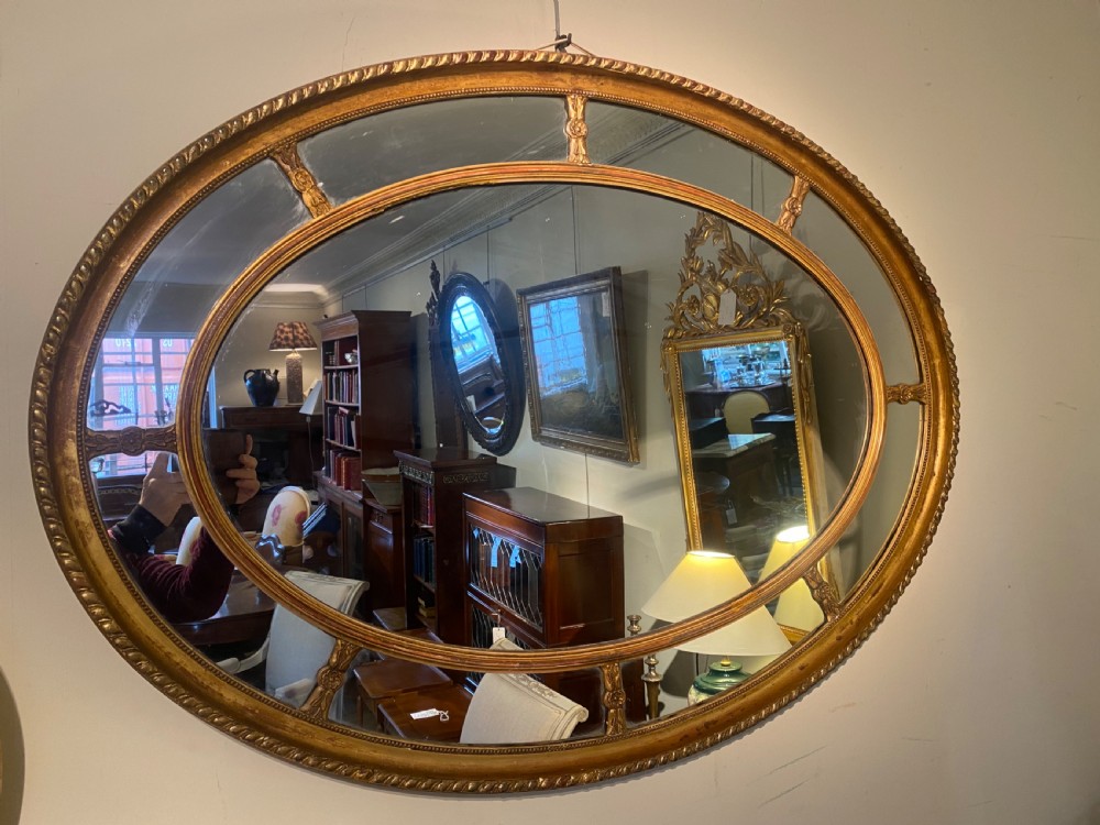 Large gilt oval mirror  View V