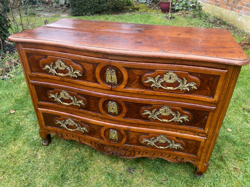 18th Century Louis XV serpentine fronted commode in cherrywood  View II