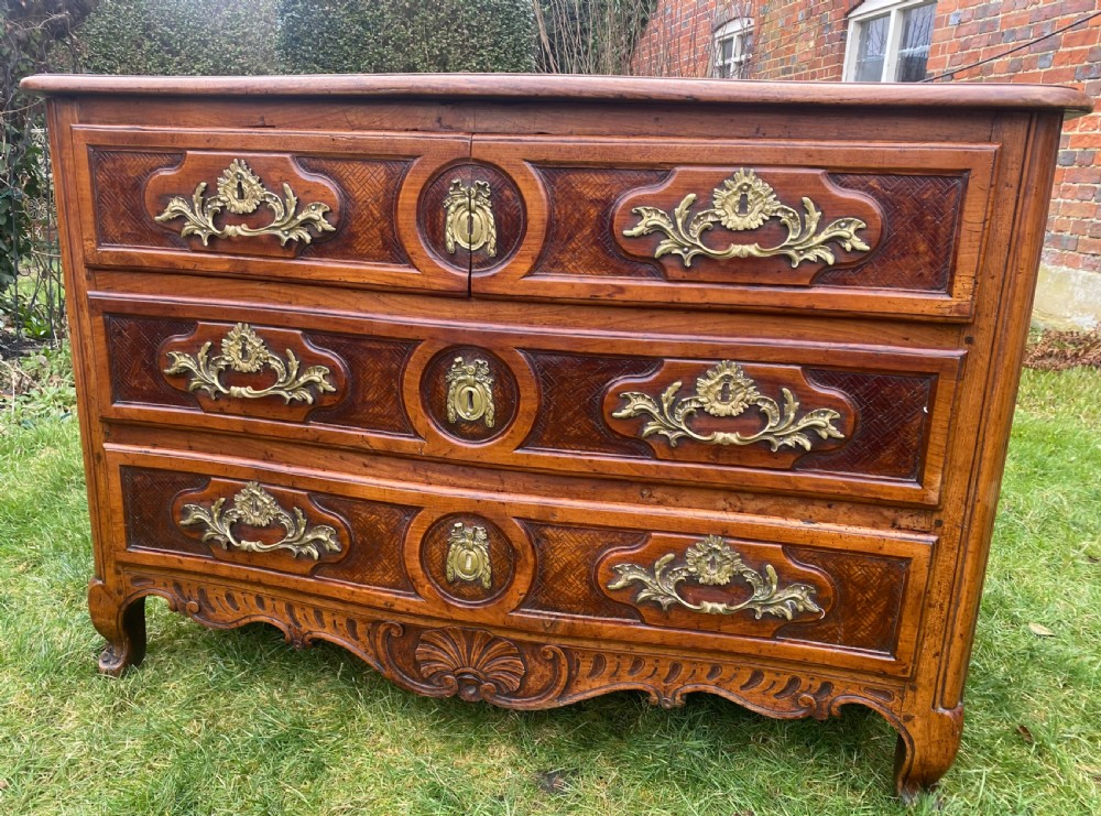 18th Century Louis XV serpentine fronted commode in cherrywood  View III