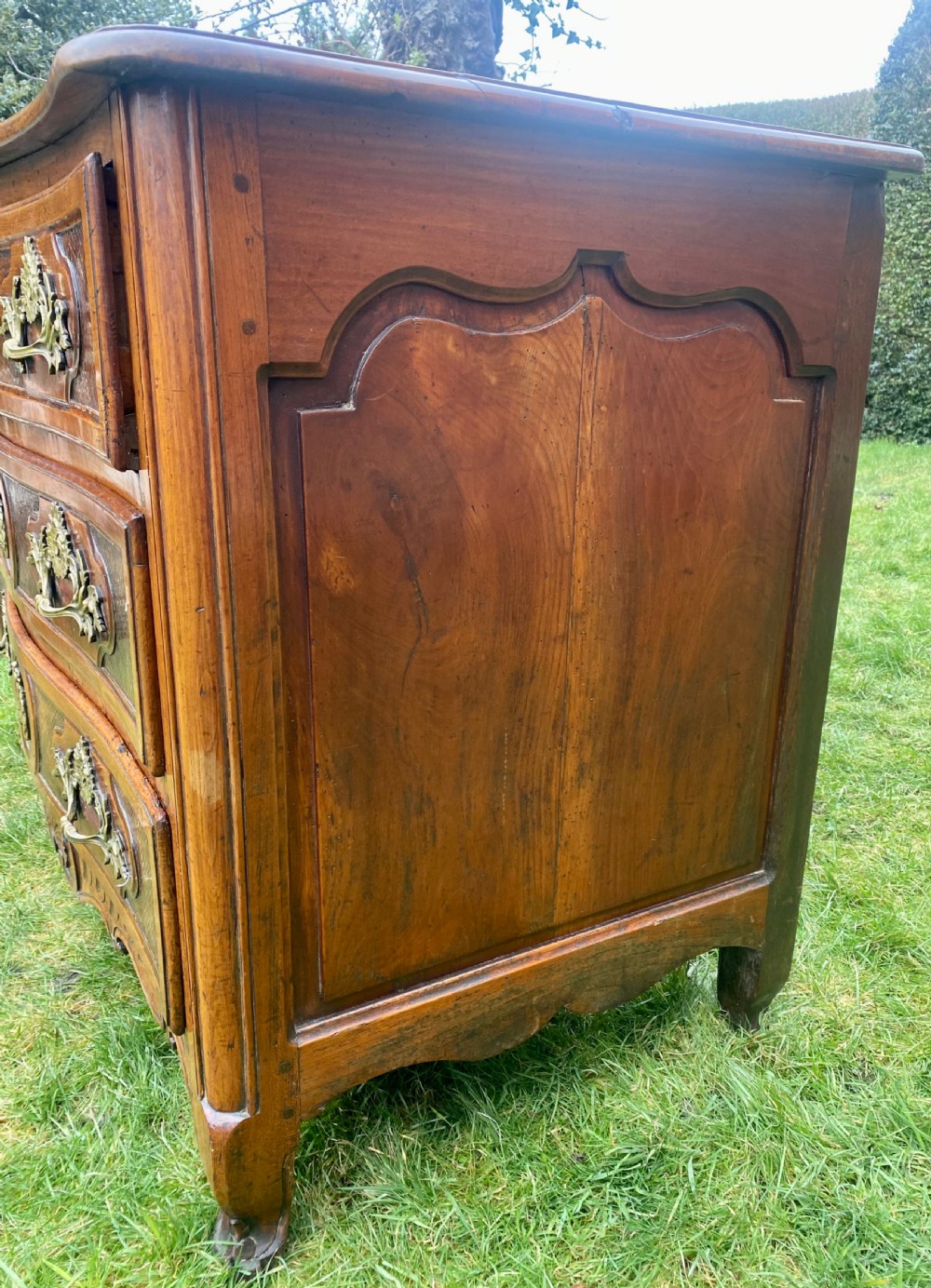 18th Century Louis XV serpentine fronted commode in cherrywood  View V