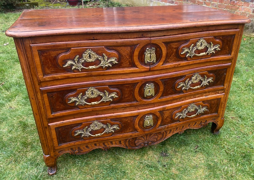 18th Century Louis XV serpentine fronted commode in cherrywood  View VIII