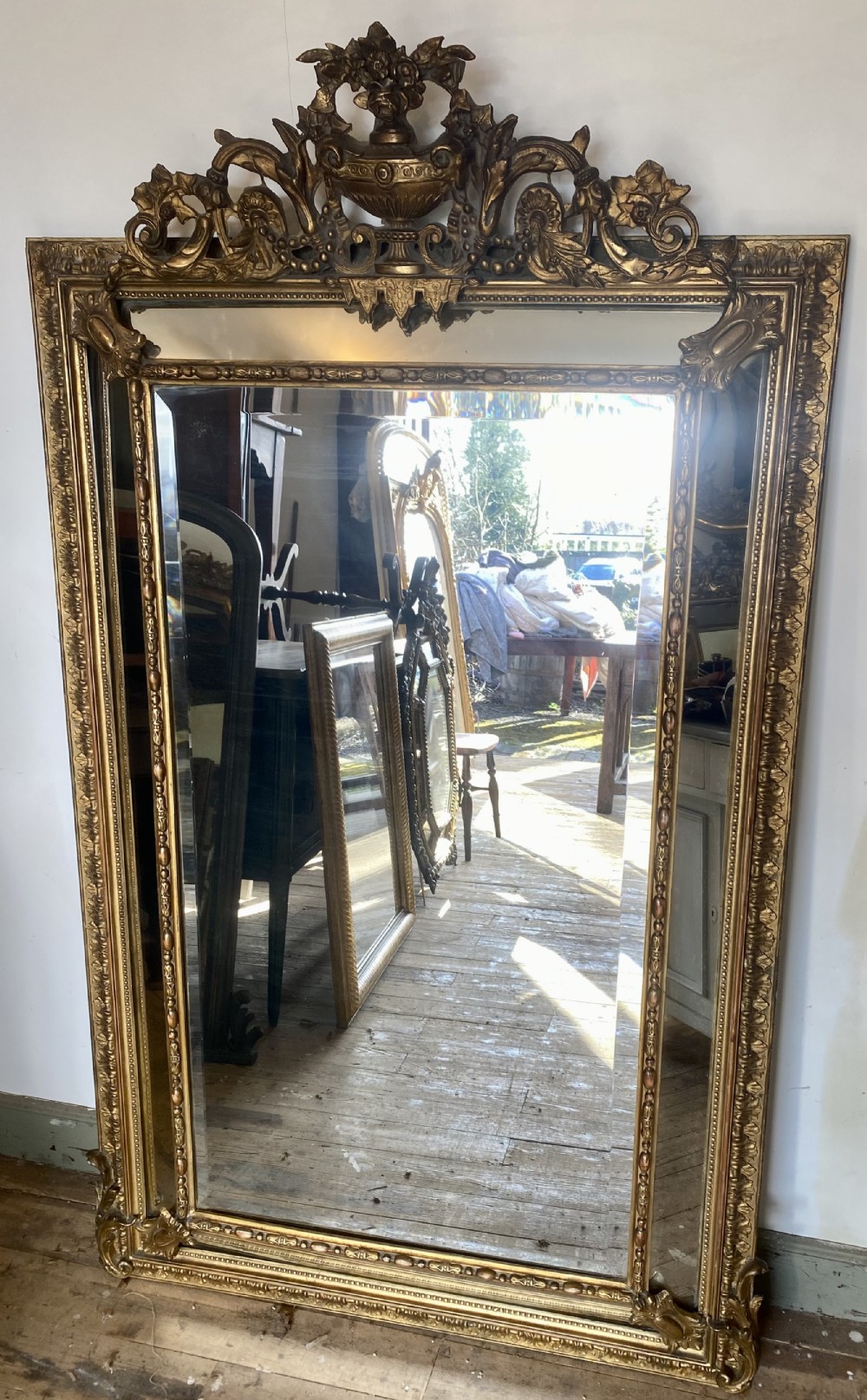 Large French margin mirror in gilt