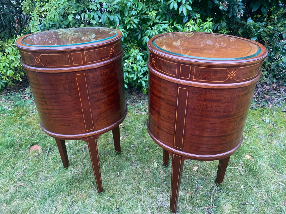 Pair of oval mahogany inlaid bedside tables  View II
