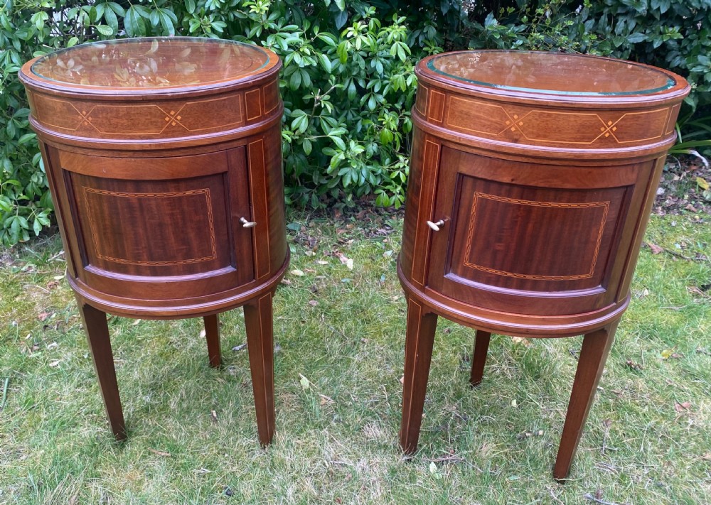Pair of oval mahogany inlaid bedside tables  View V