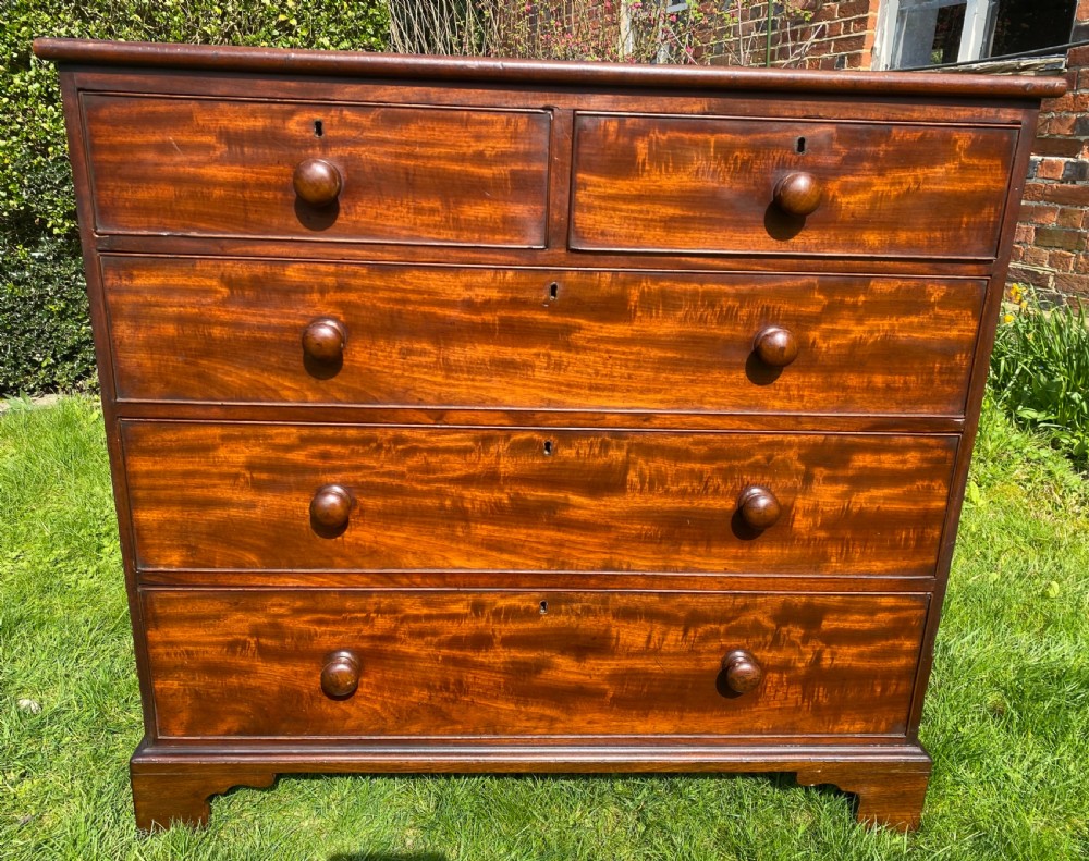 Flame Mahogany chest of drawers on bracket feet  View II