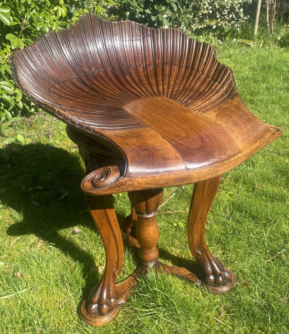 Venetian carved walnut piano stool 