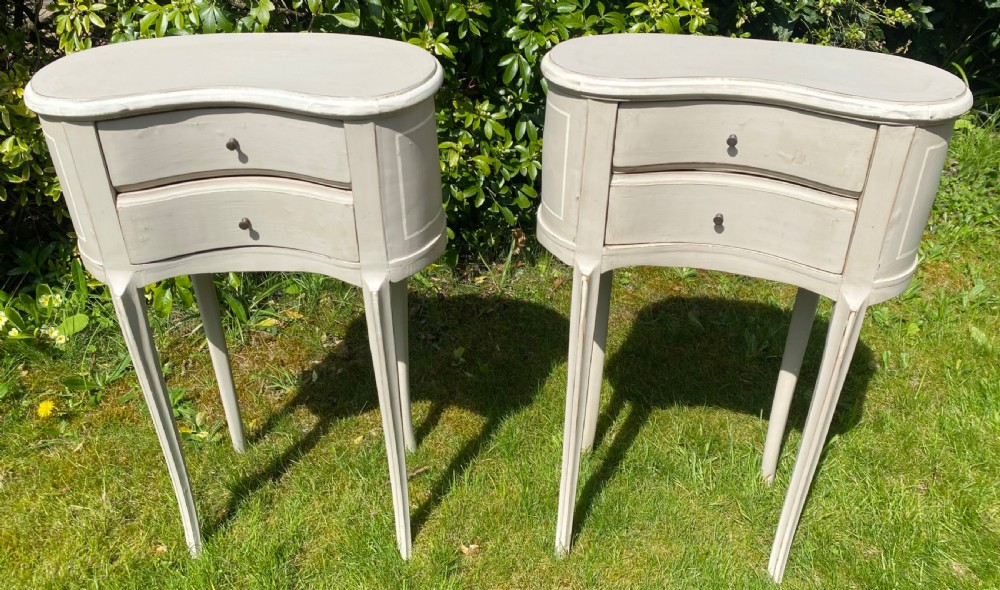 Pair of kidney shaped bedside tables  View III