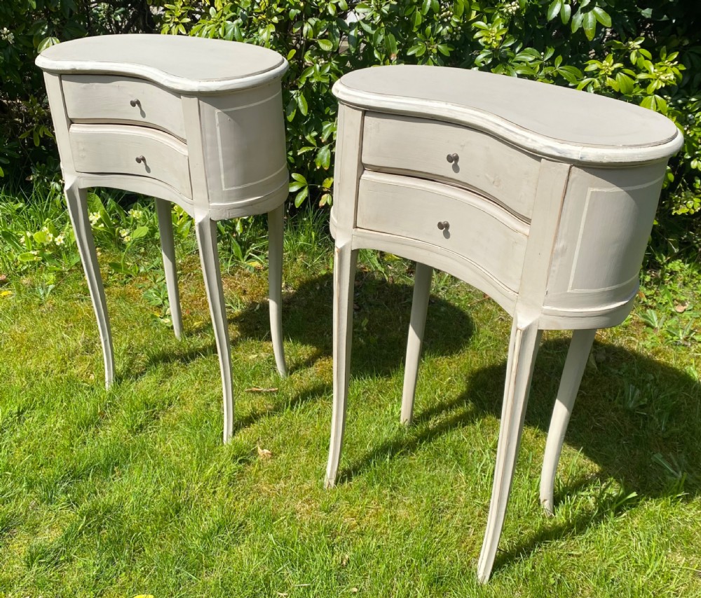 Pair of kidney shaped bedside tables  View IV