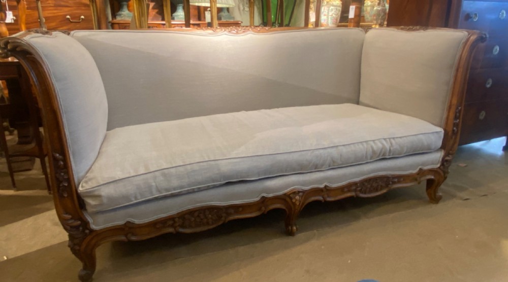 Large carved wood sofa in grey linen View II