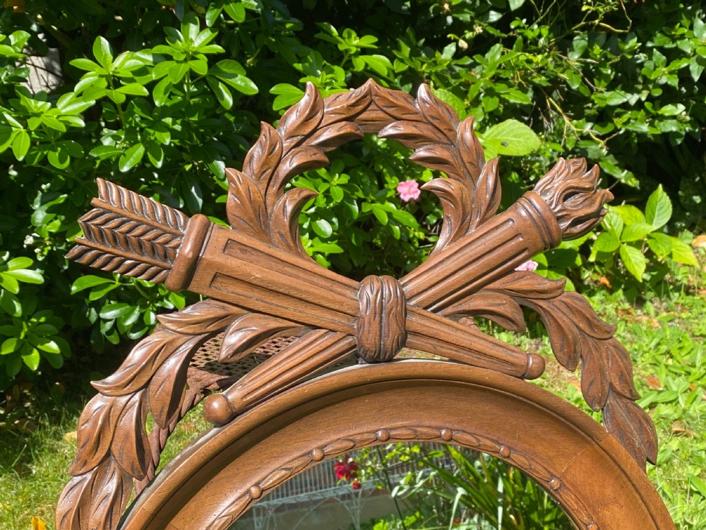 Round walnut mirror with crest View III