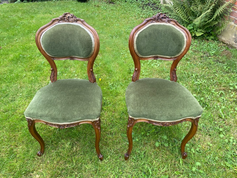Pretty pair of carved walnut side chairs View III