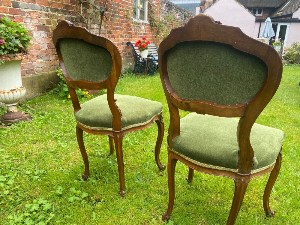 Pretty pair of carved walnut side chairs View V
