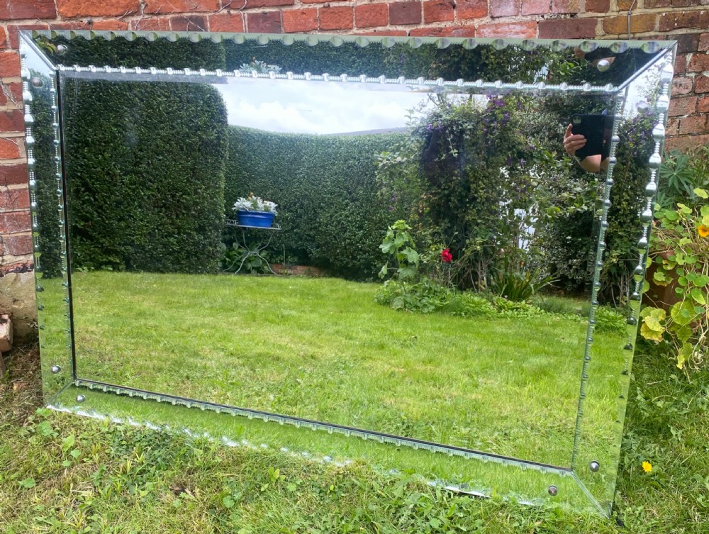 A Large Venetian cut glass mirror 