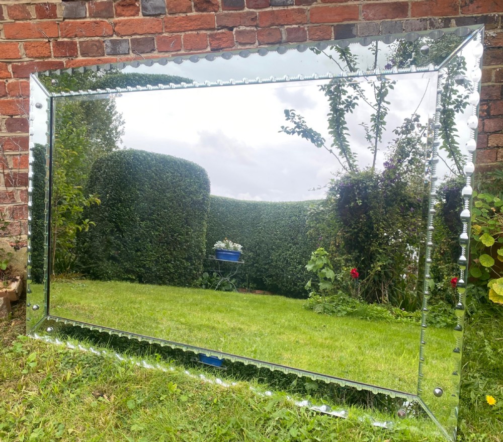 A Large Venetian cut glass mirror  View II