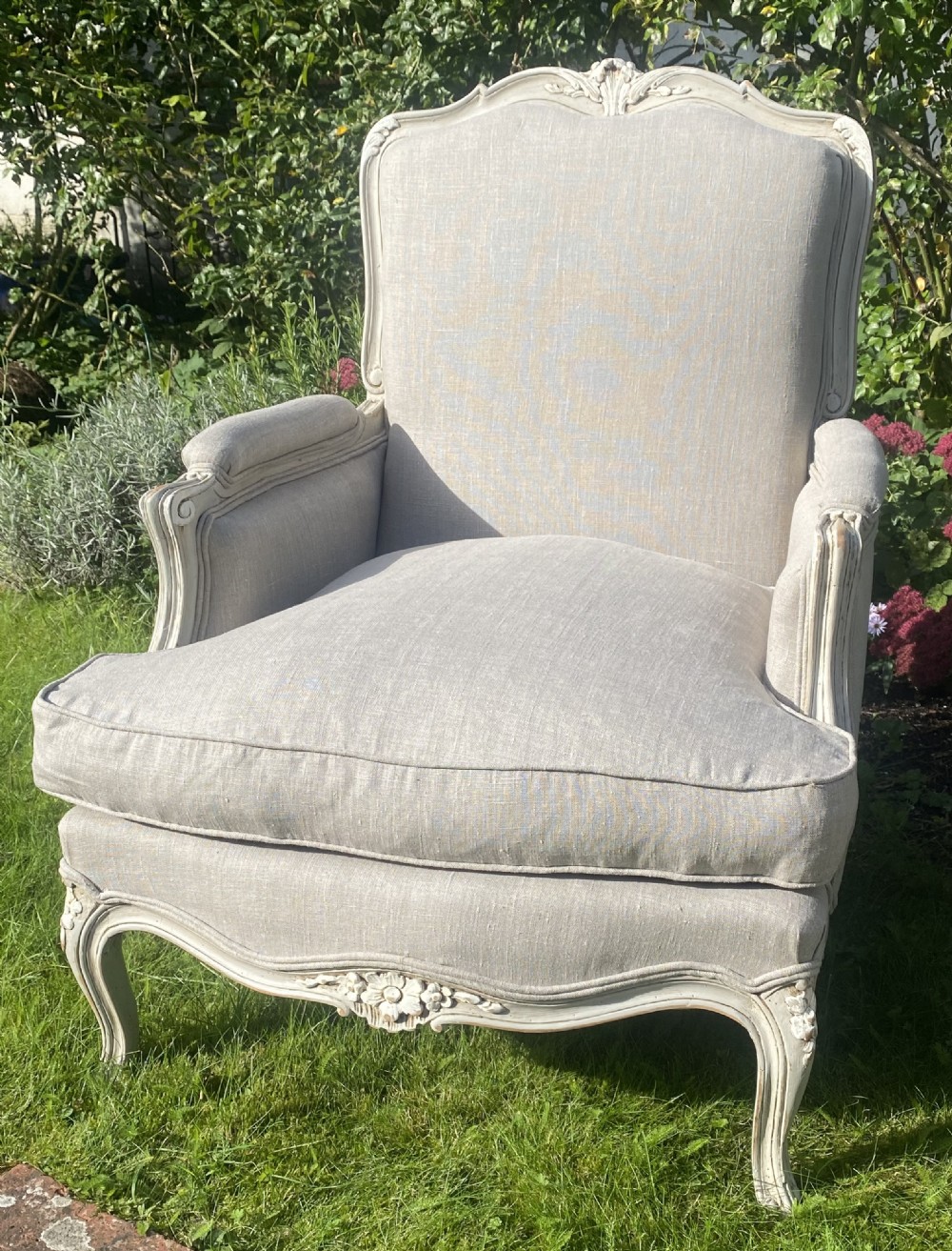 A Pair of newly upholstered French Bergere armchairs in grey linen View IV