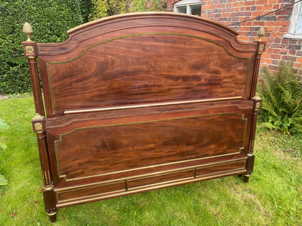 Kingsize brass inlaid bed in flame mahogany 