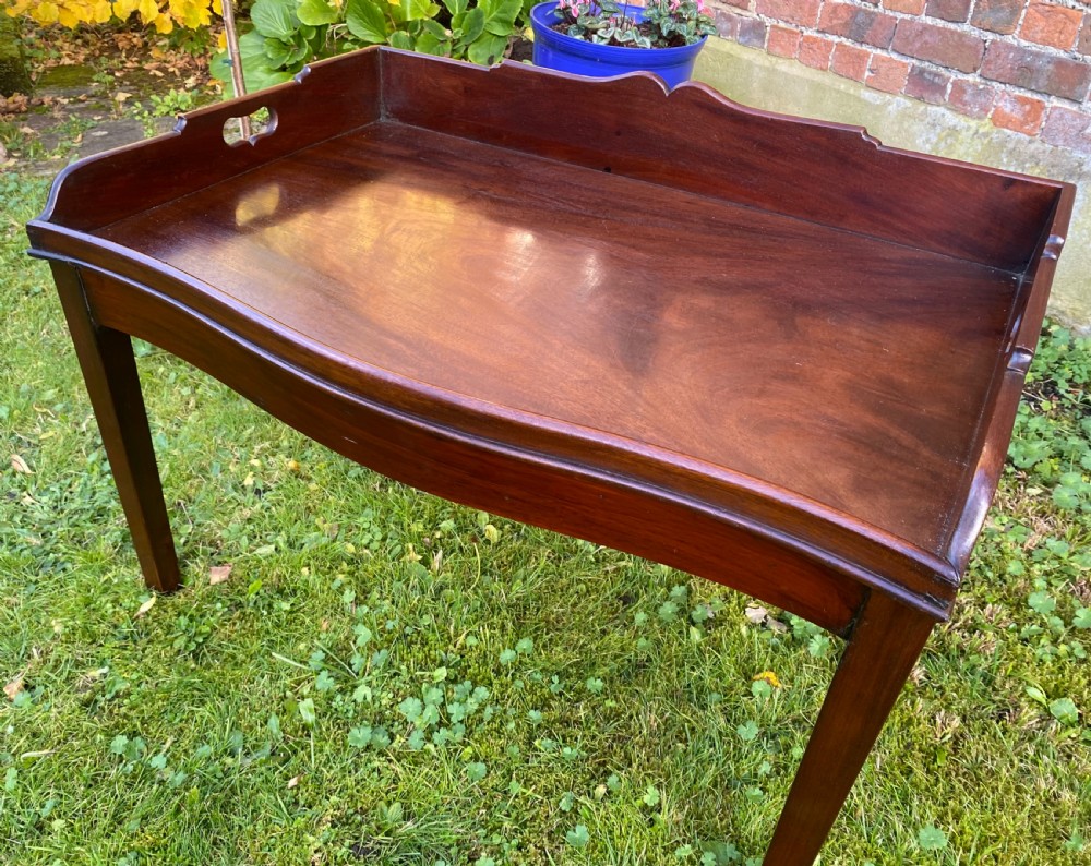 Georgian flame mahogany tray on later stand