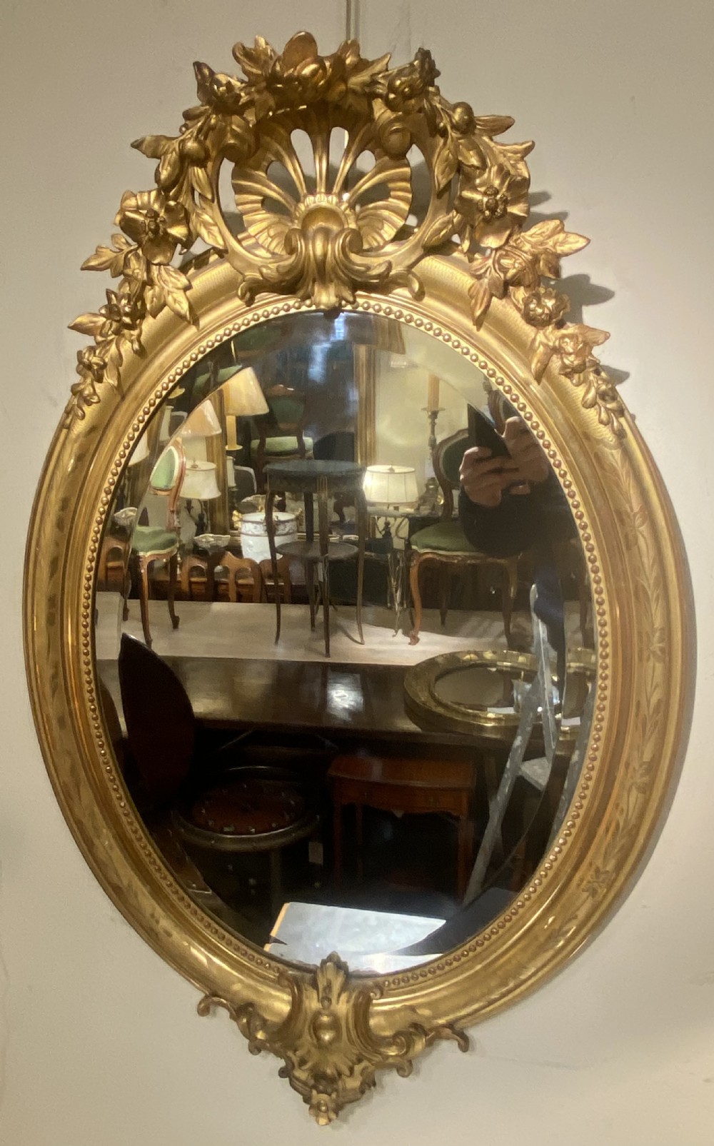 Large oval gilt mirror 