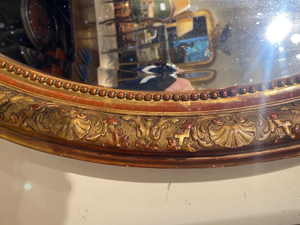 Large 19th Century oval gilt mirror  View IV