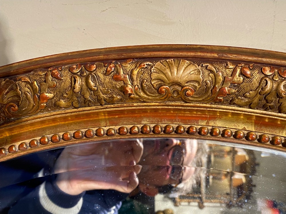 Large 19th Century oval gilt mirror  View VI