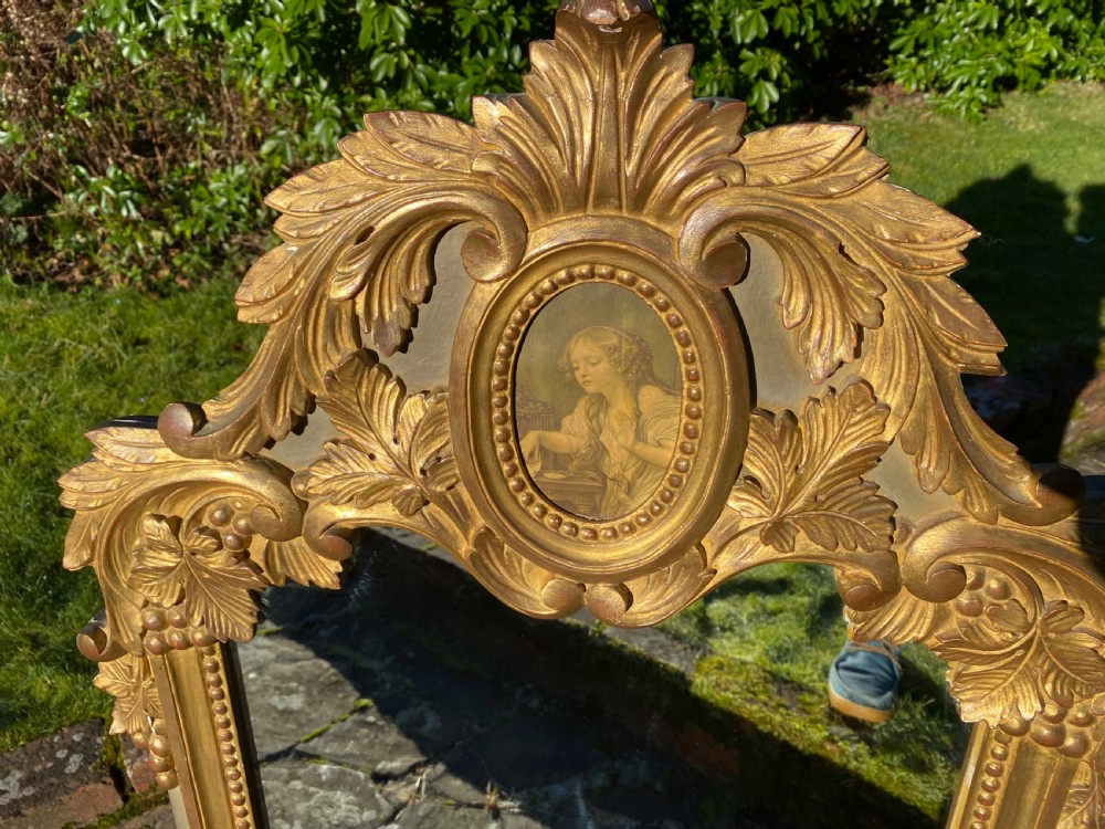 Carved giltwood wall mirror  View II