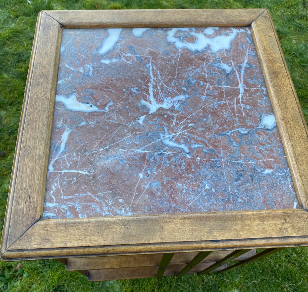 Revolving bookcase in walnut with marble top View III