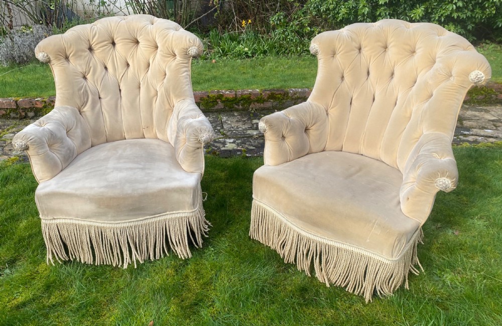 Pair of buttoned back 19th Century armchairs 