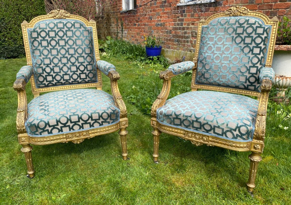Pair of 19th Century Gilt armchairs 