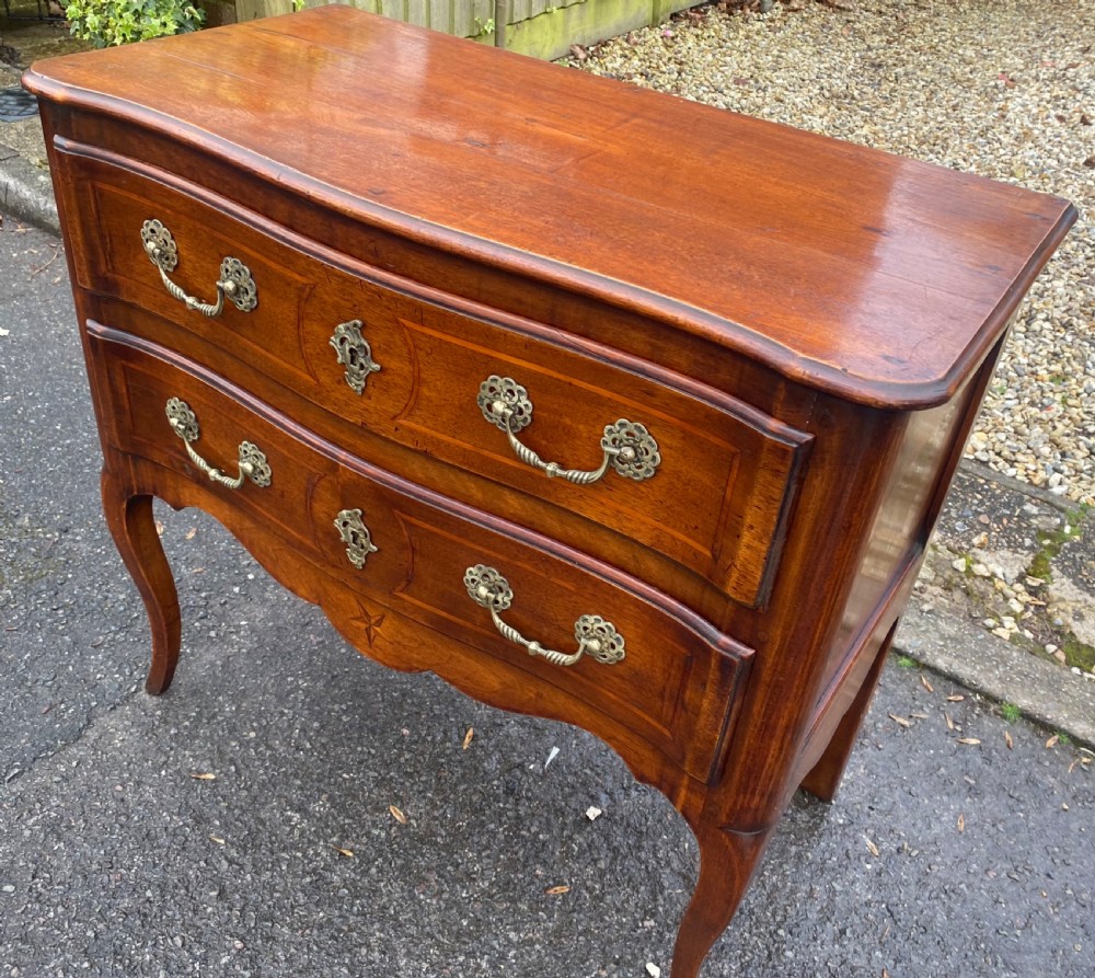 Small walnut serpentine fronted commode  View V
