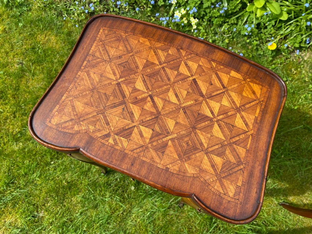 An elegant pair of Kingwood reading tables  View IV