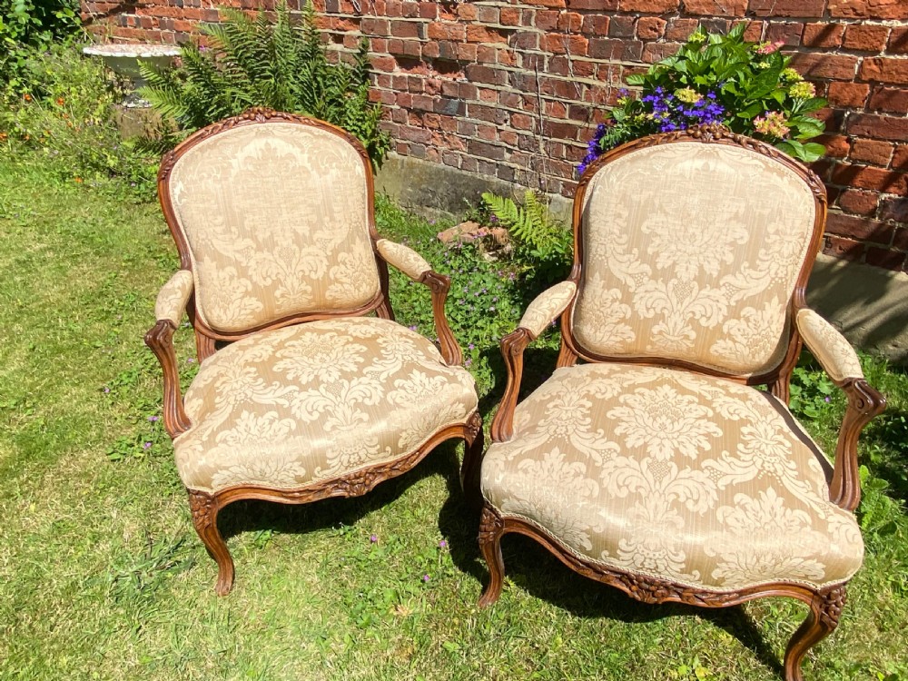 Pair of carved walnut armchairs  View II