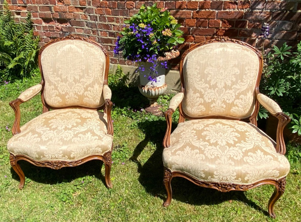 Pair of carved walnut armchairs  View V