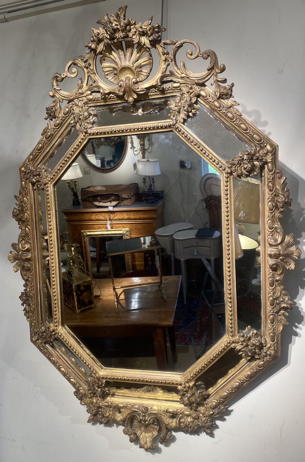 French margin or cushion mirror in gilt