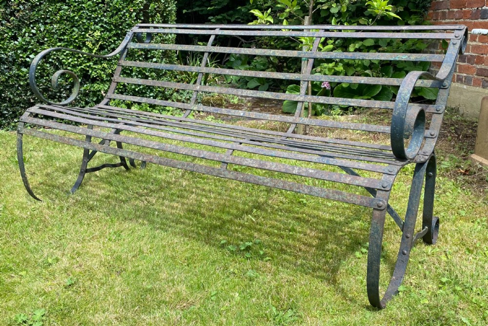 Wrought iron strapwork garden bench