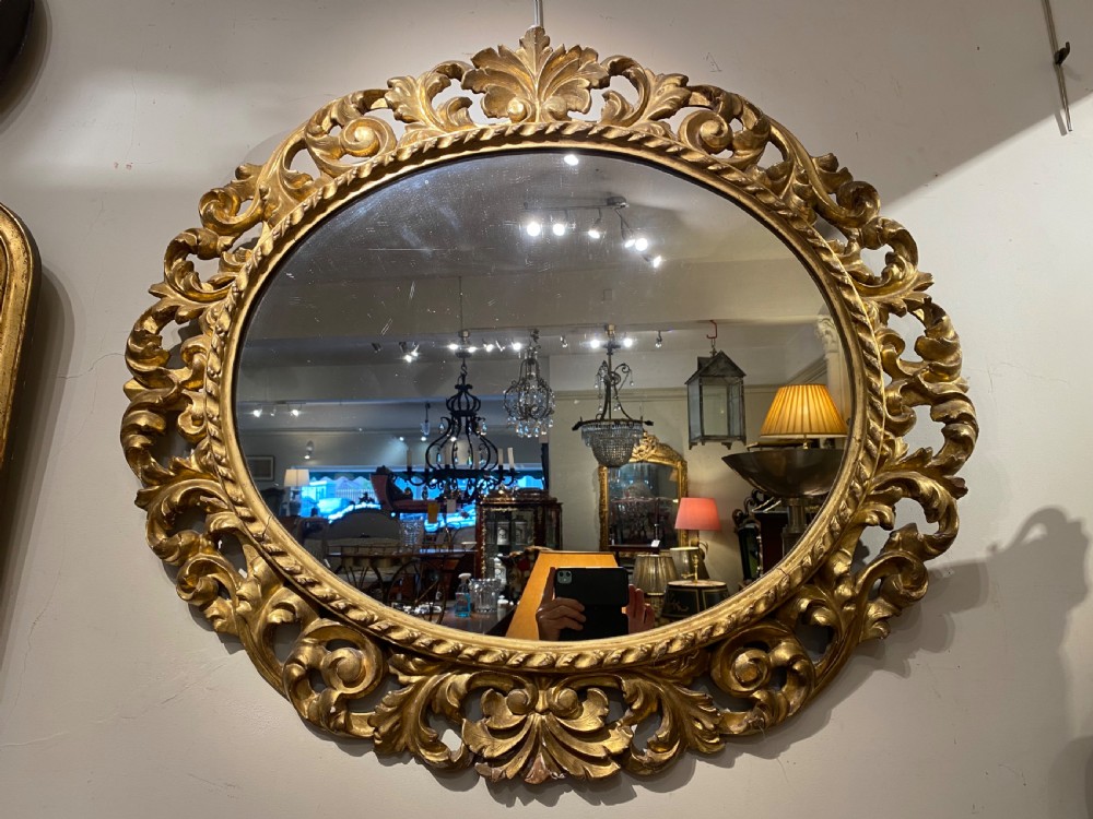 Early carved giltwood oval mirror View VI