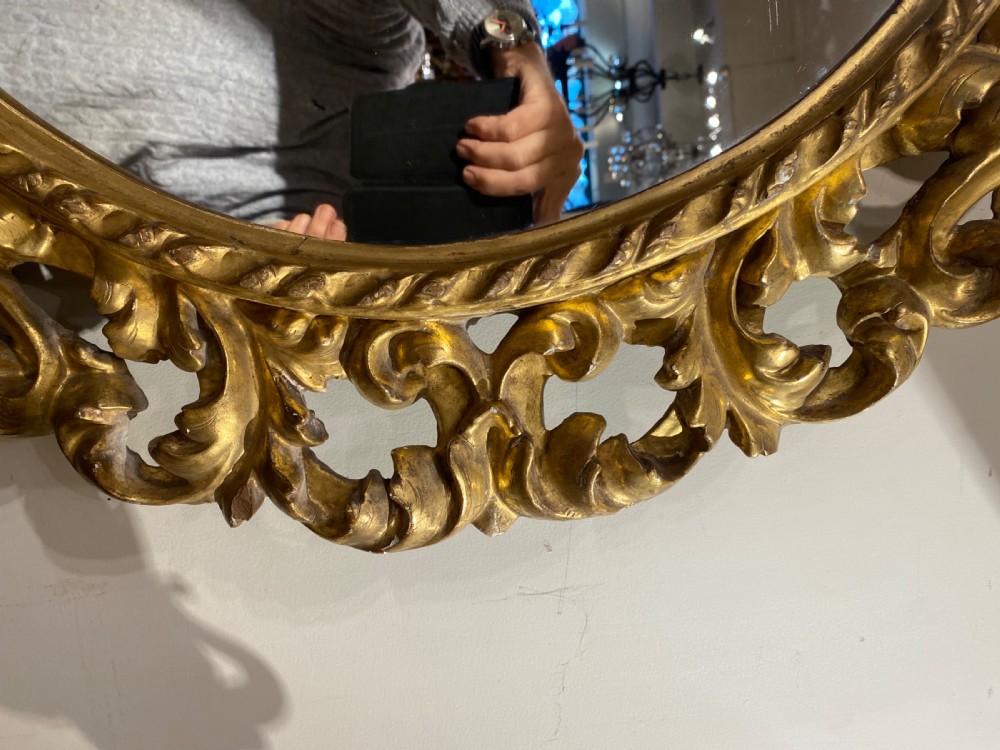 Early carved giltwood oval mirror View VII