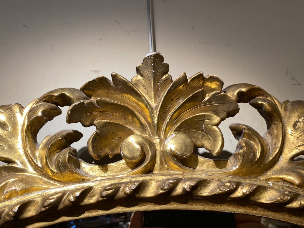 Early carved giltwood oval mirror View VIII