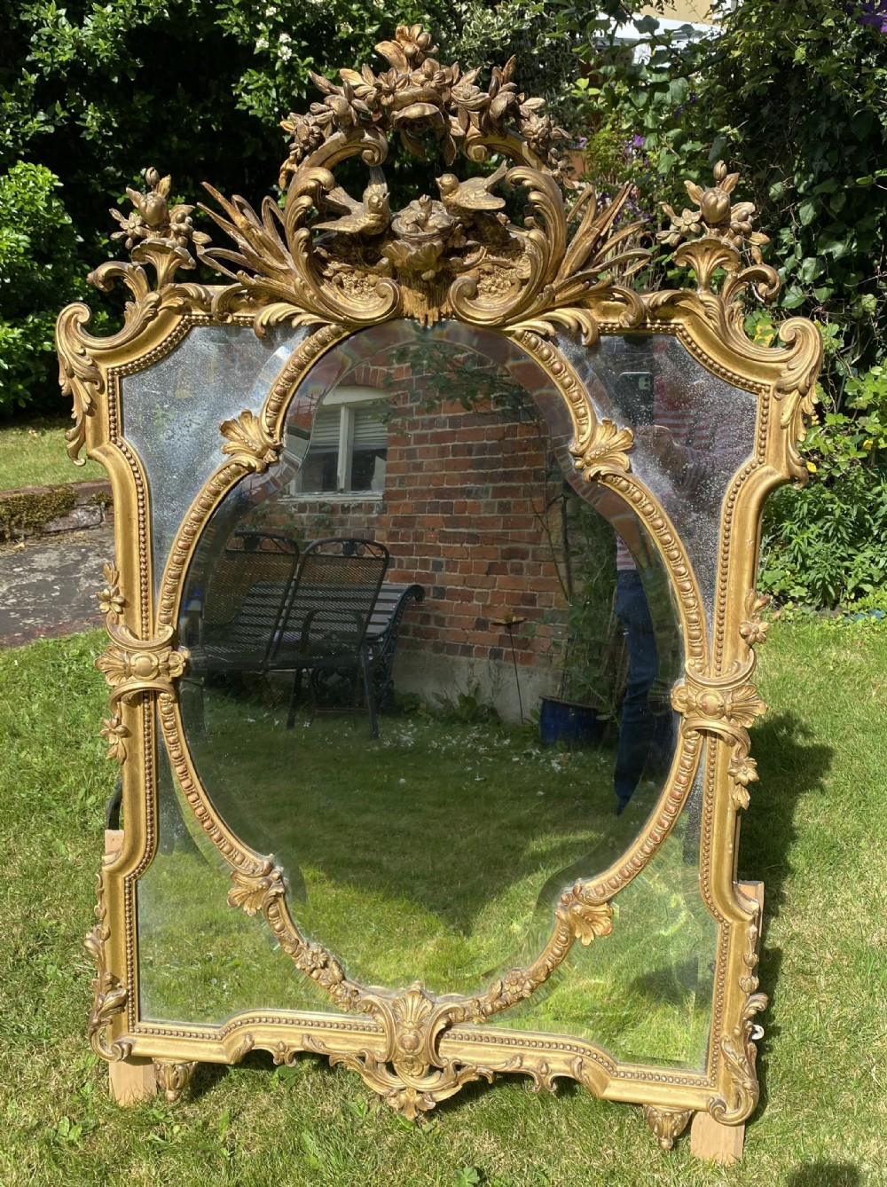 Decorative gilt mirror with love birds 