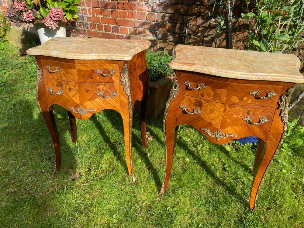 A pair of marquetry bedside tables  View III