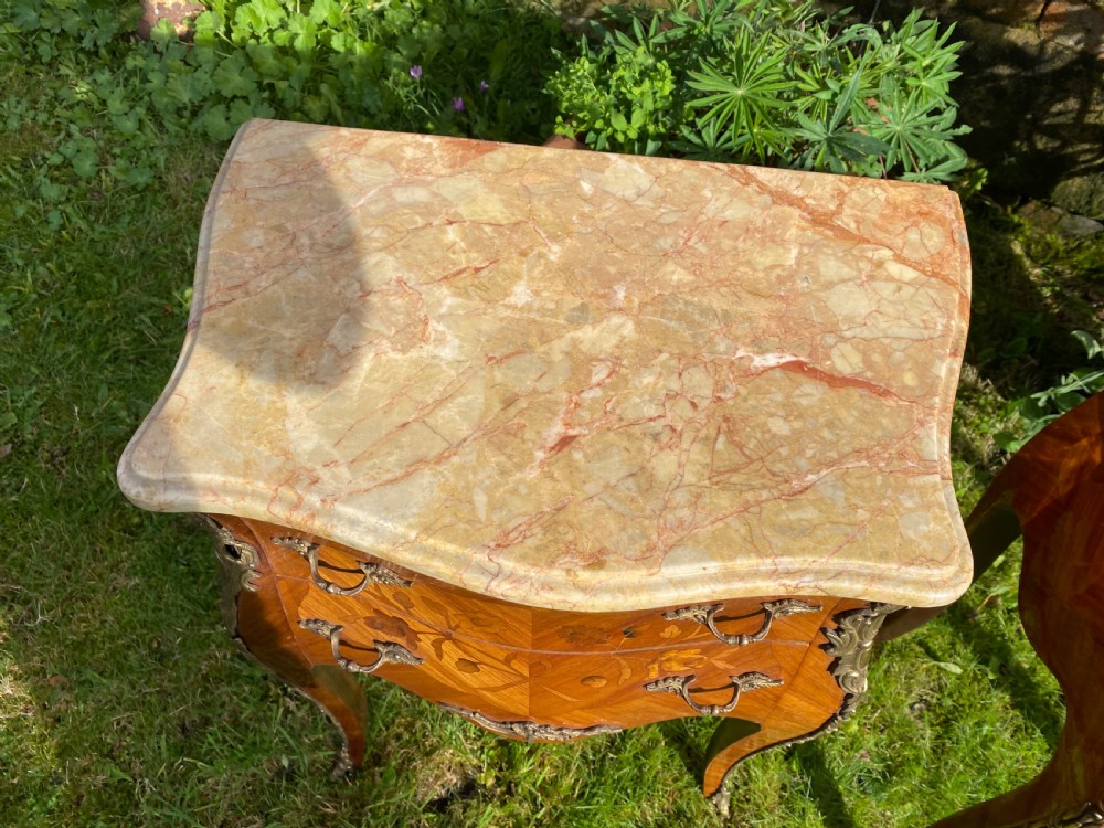 A pair of marquetry bedside tables  View IV