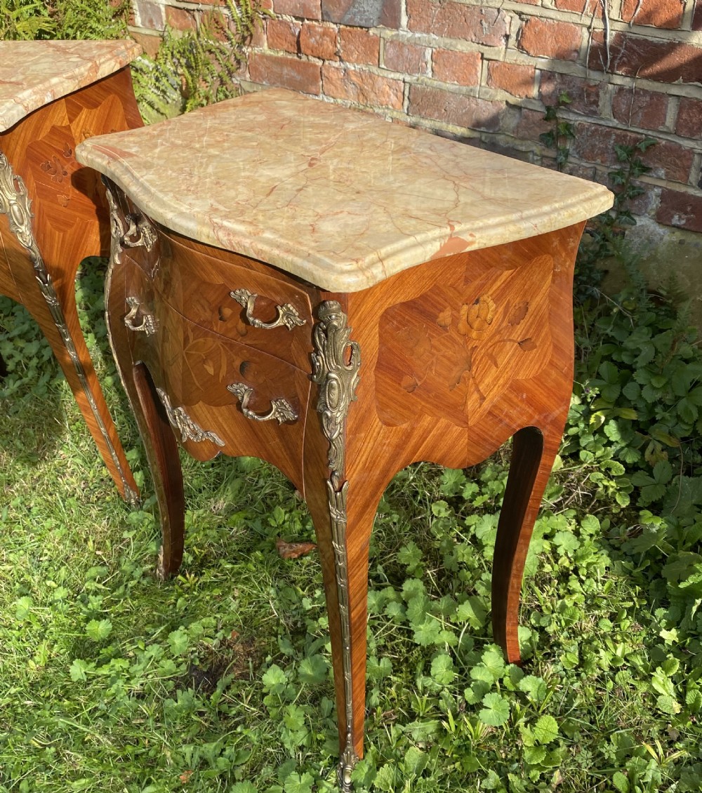 A pair of marquetry bedside tables  View VI